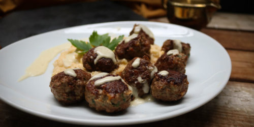 Feature post image for recipe on keto meatballs with cauliflower mash